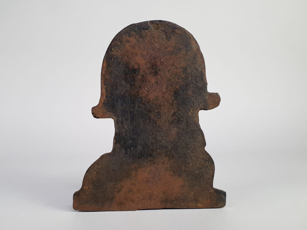 Cast iron antique Doorstop of a smiling Georgian gentleman's face