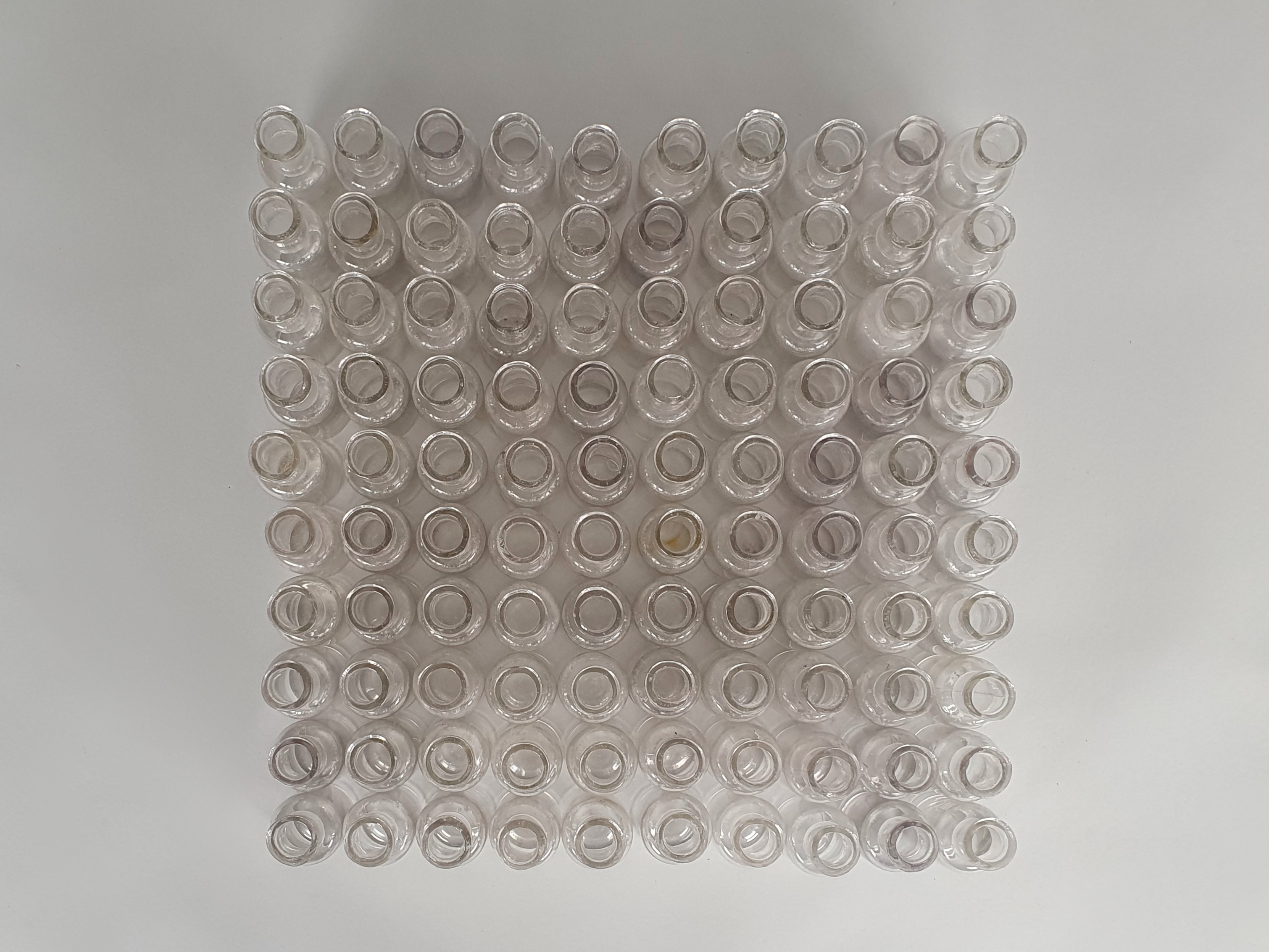 100 antique glass apothecary bottles from above