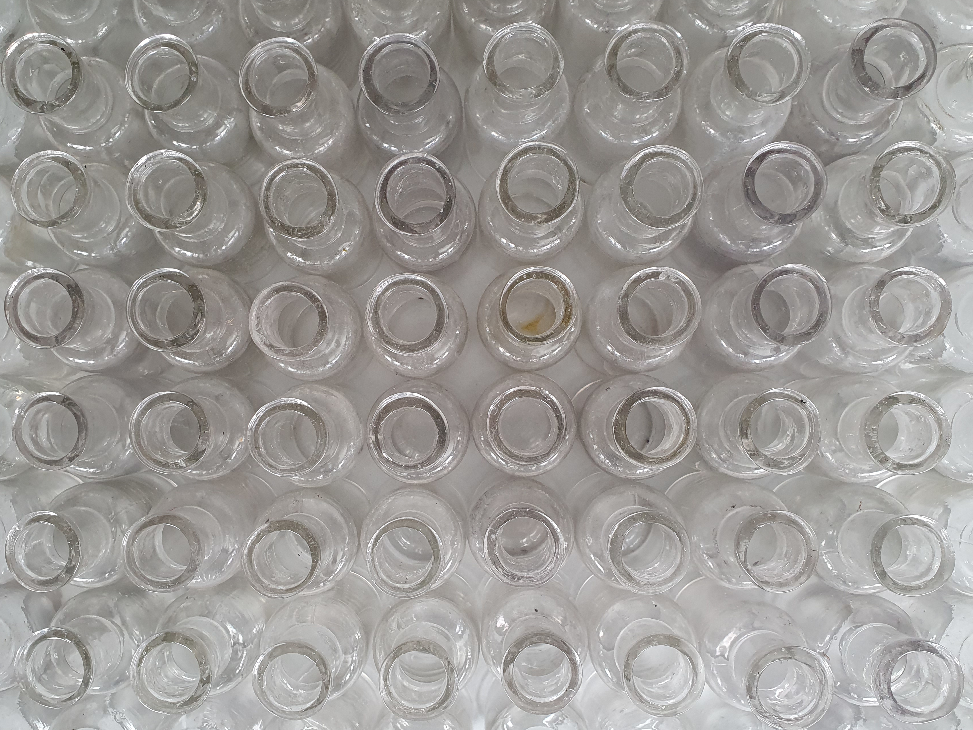 100 antique glass apothecary bottles close up