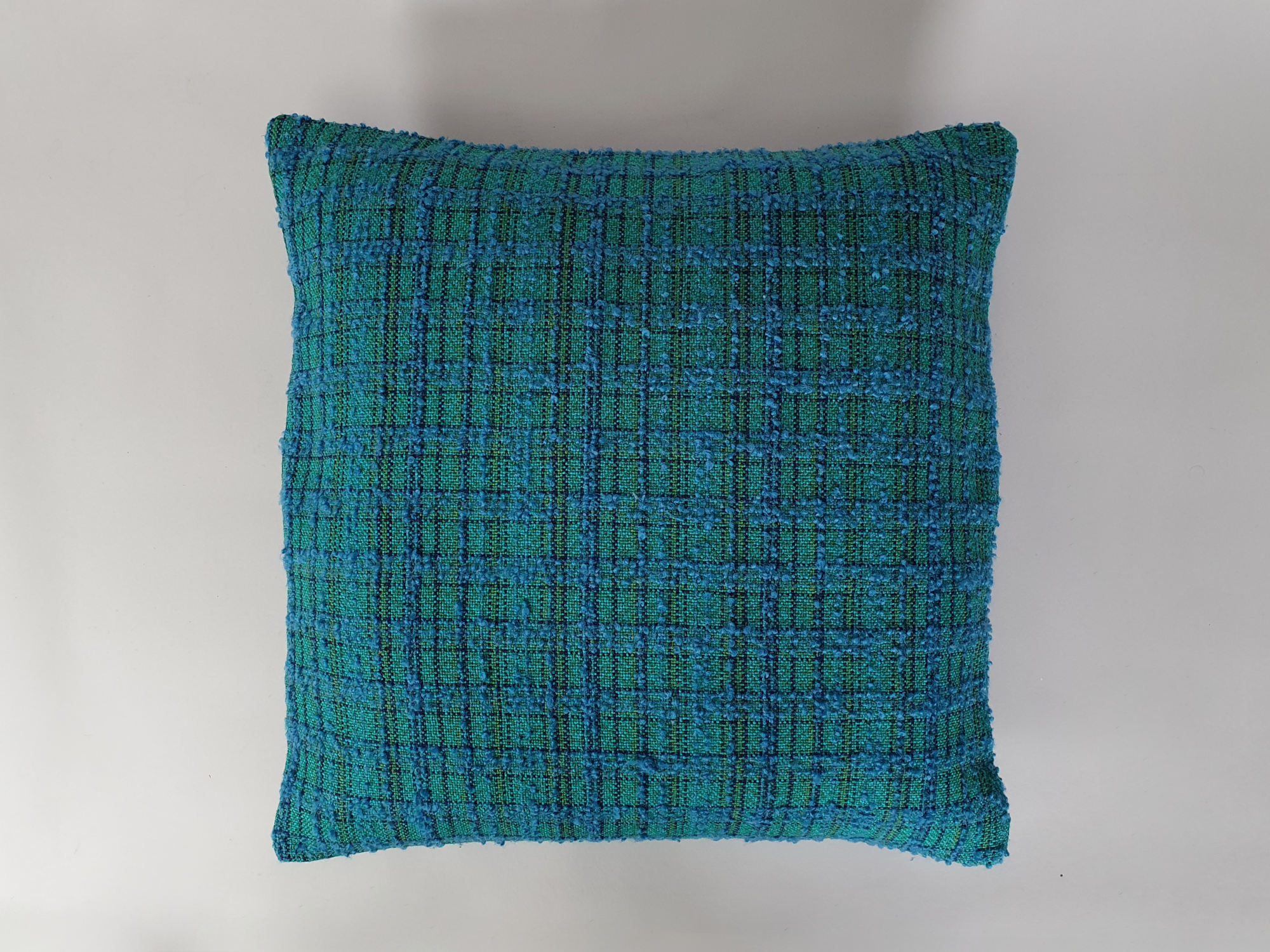 Cushion in mid century bouclé fabric