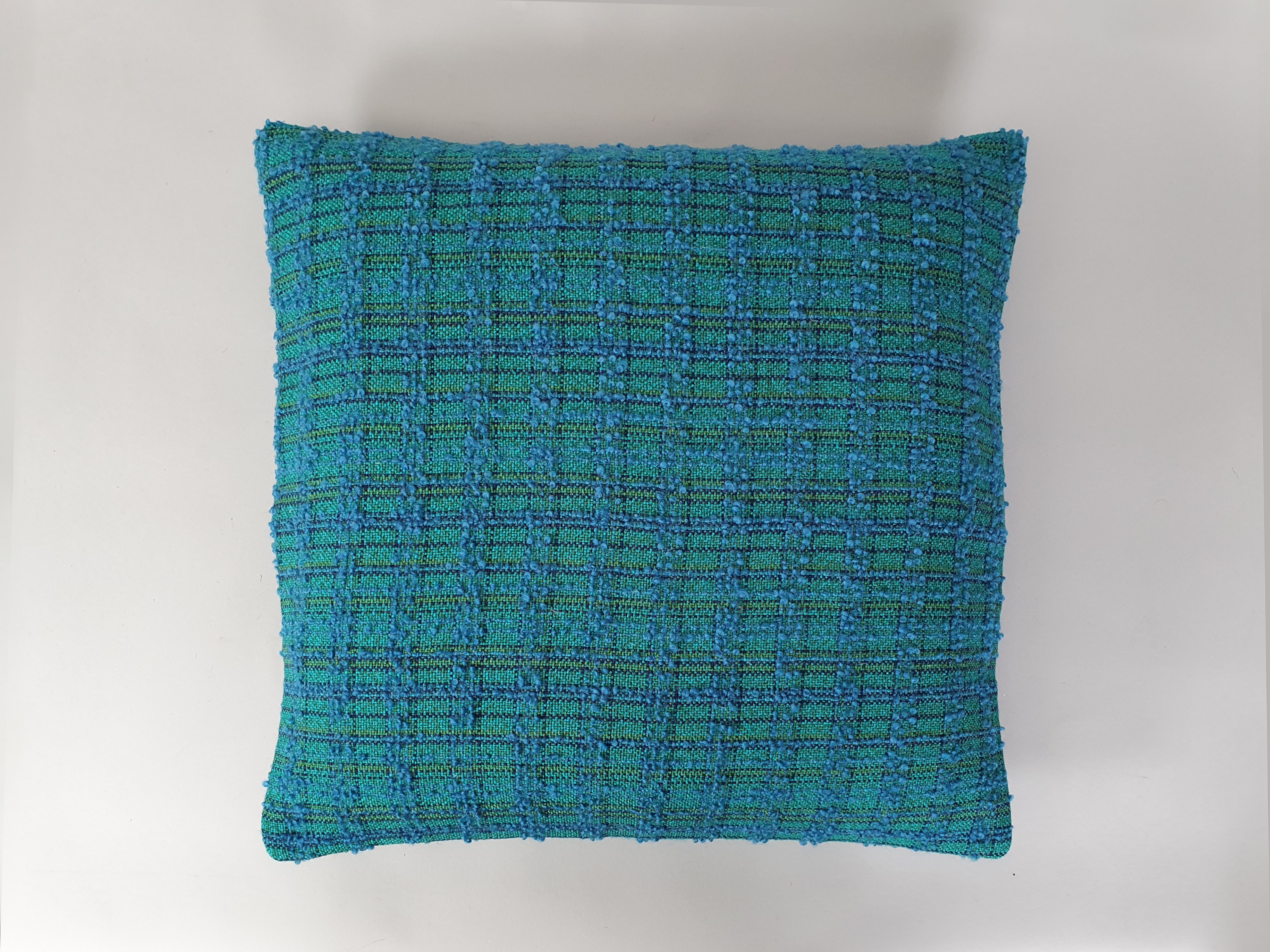 Cushion in mid century bouclé fabric