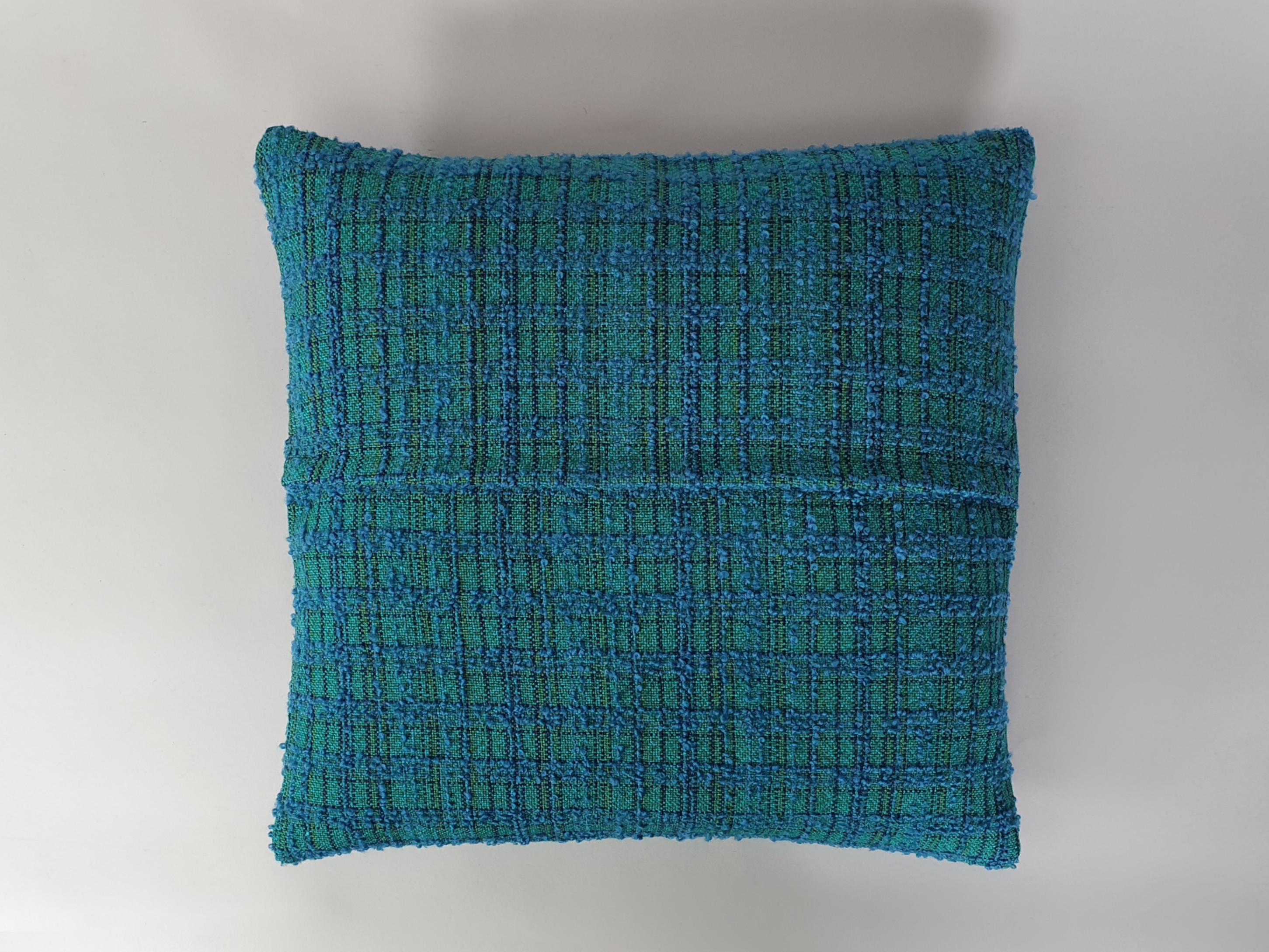 mid century cushion in bouclé fabric detailing