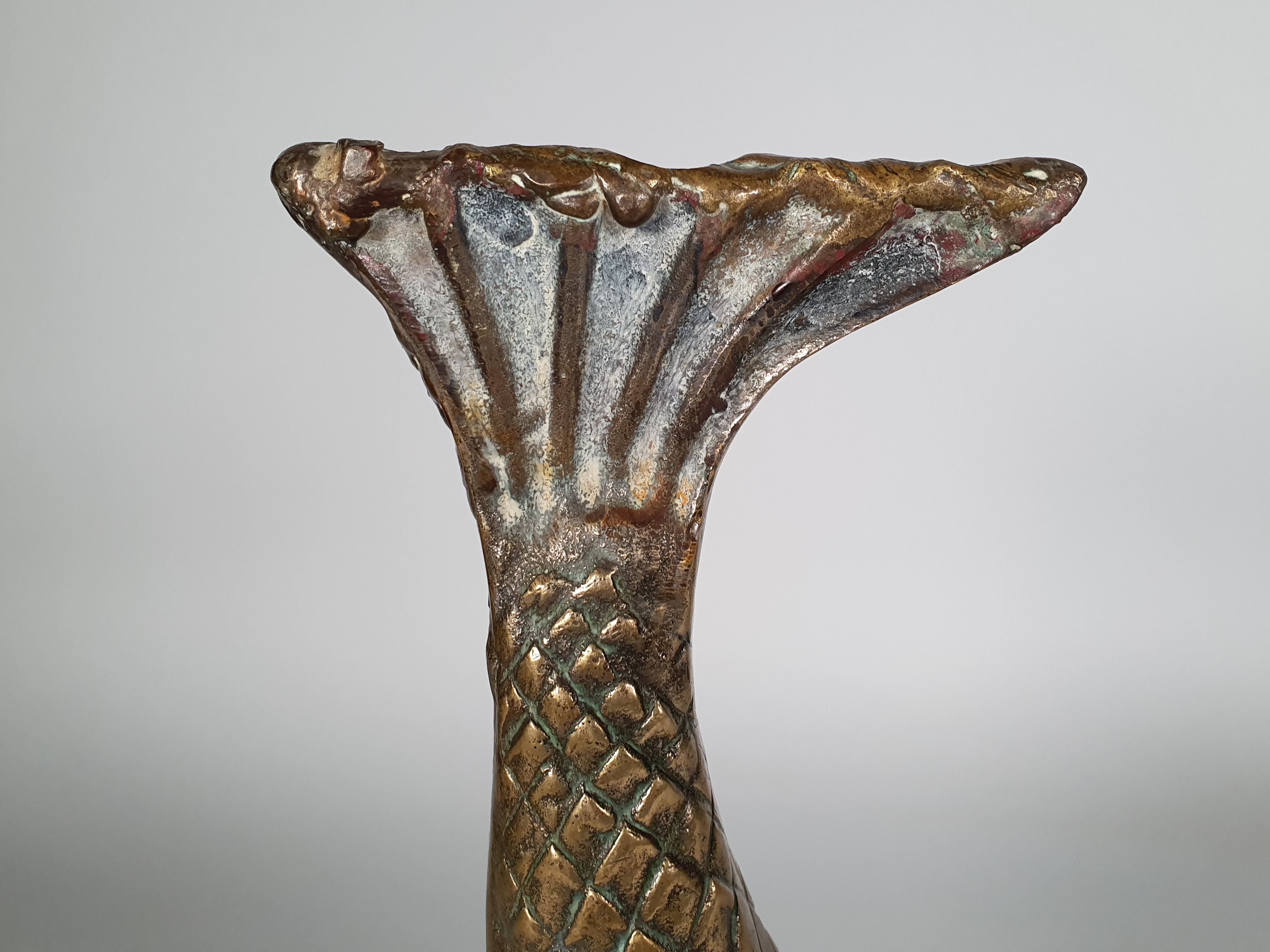 antique brass Dolphin Sculpture wide shot