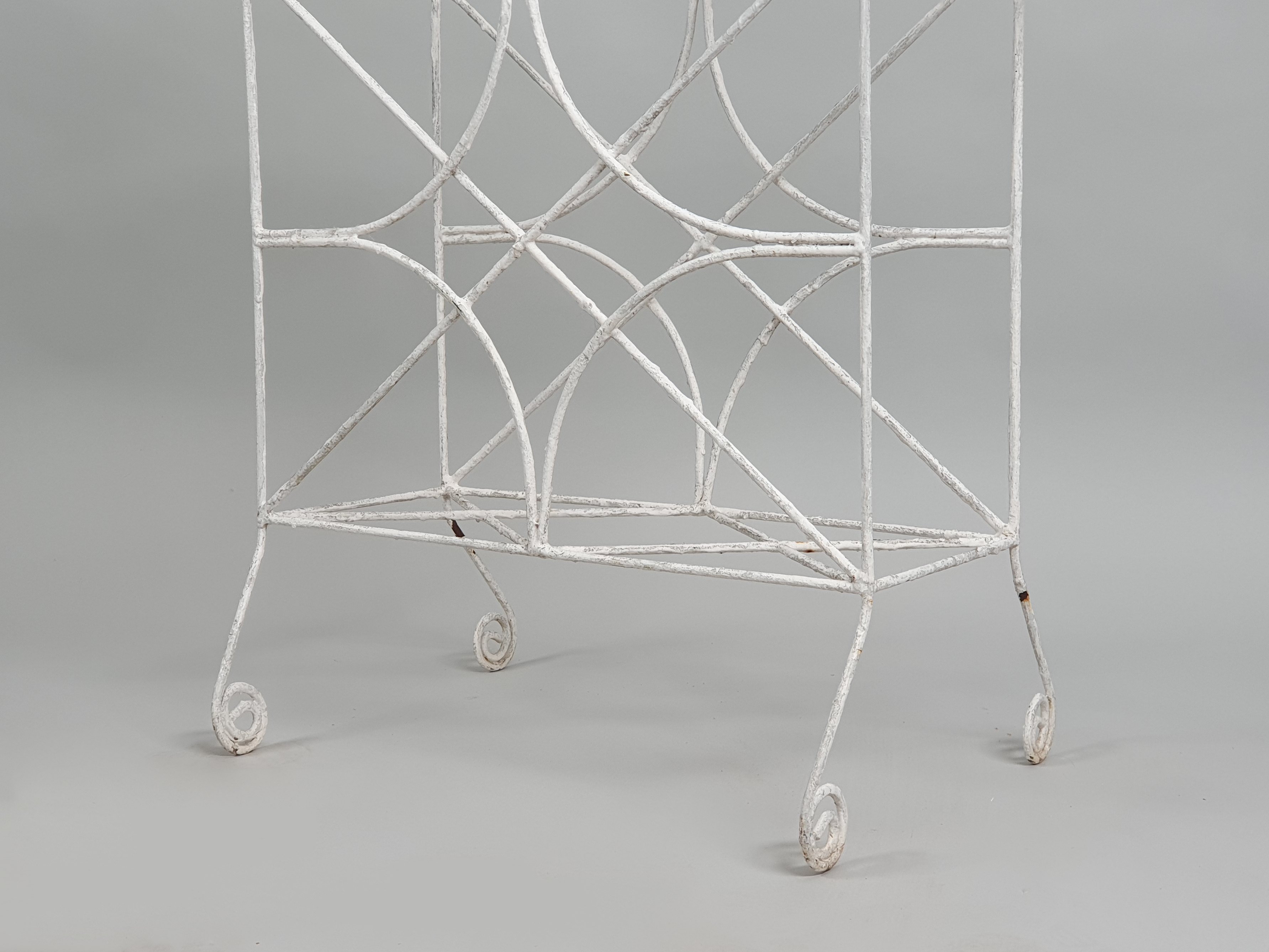 Garden antique wire work plant stand detail of feet