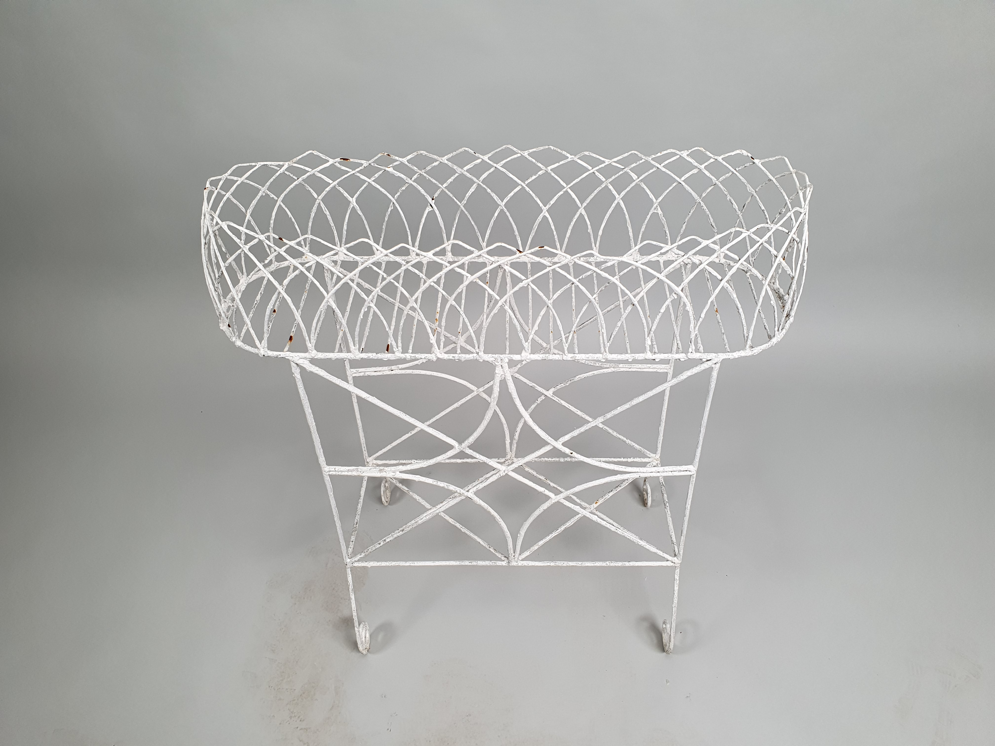 Garden antique wire work plant stand looking down