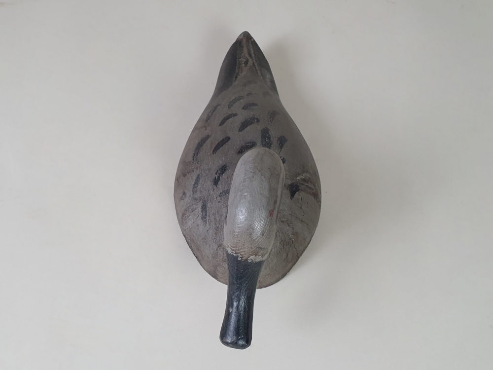 Grey antique wooden Decoy Duck