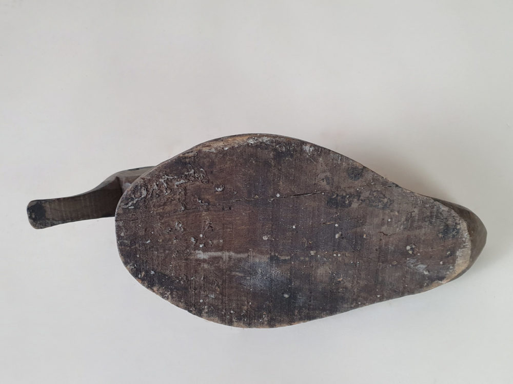 Grey antique wooden Decoy Duck
