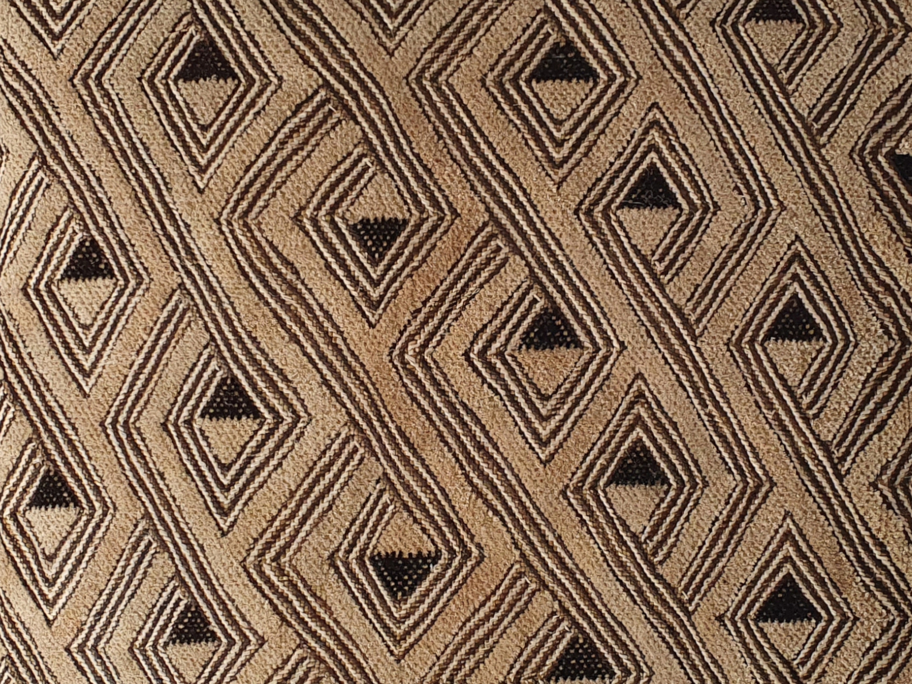 kuba cloth antique cushion close up