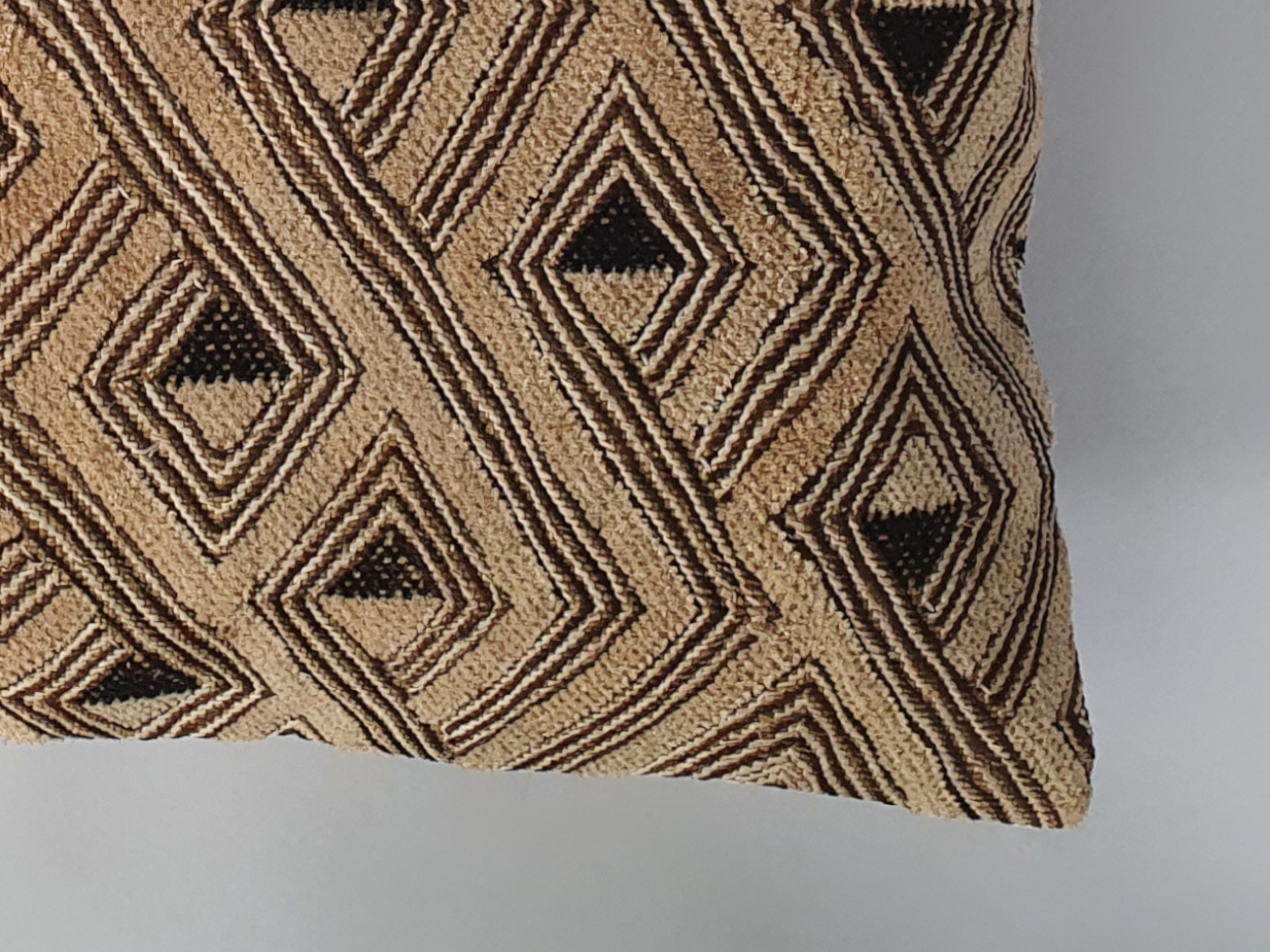 kuba cloth antique cushion detailing