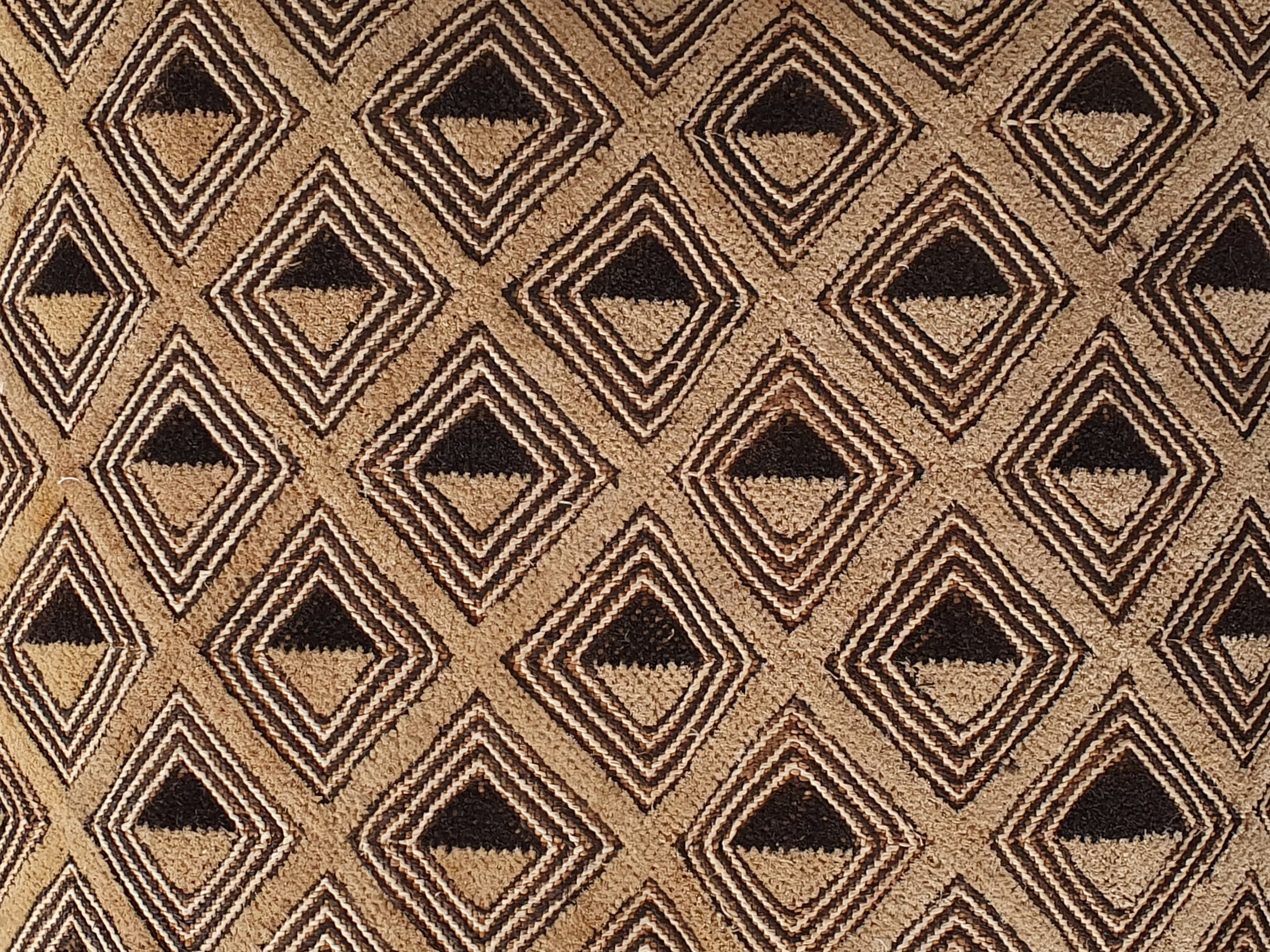 kuba cloth antique cushion close up