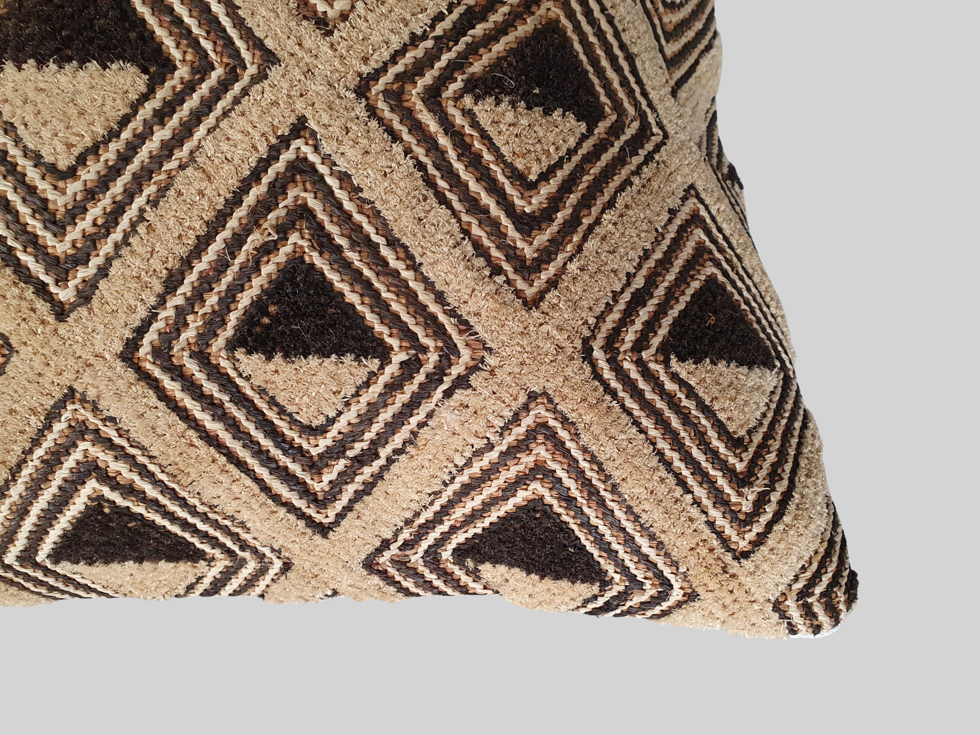 kuba cloth antique cushion detailing