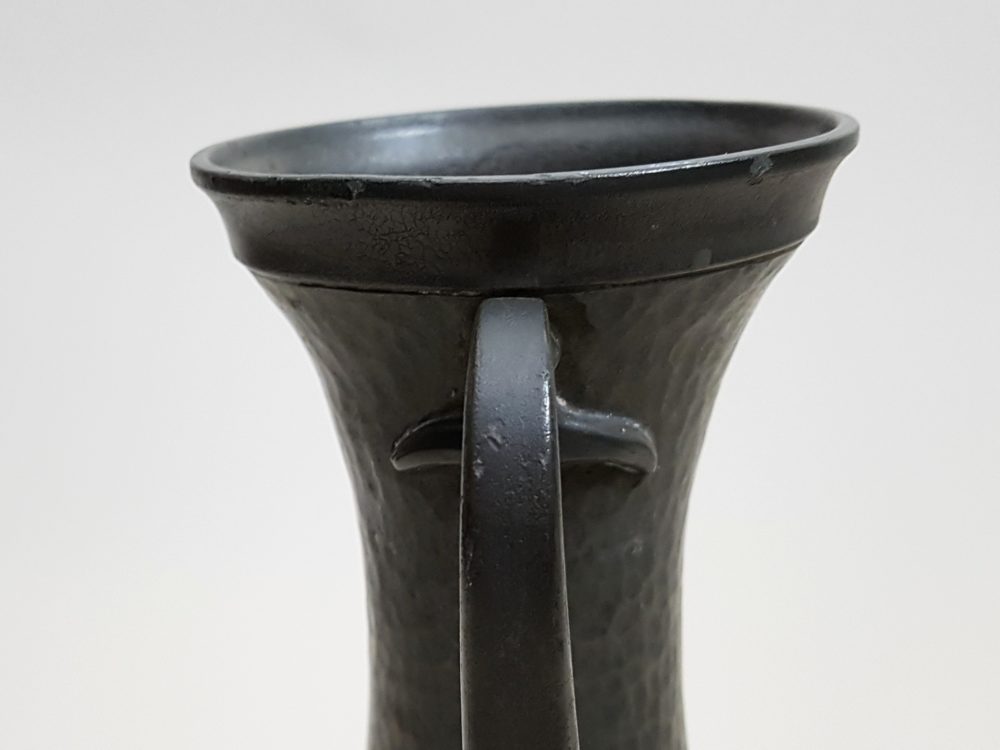 Pair of antique Art Deco beaten pewter tall decorative Vases