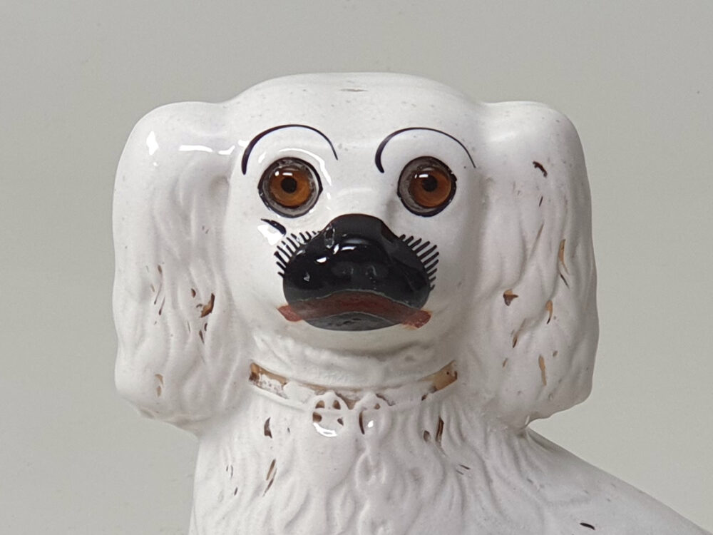 Pair of antique ceramic Victorian Staffordshire Spaniel Dogs