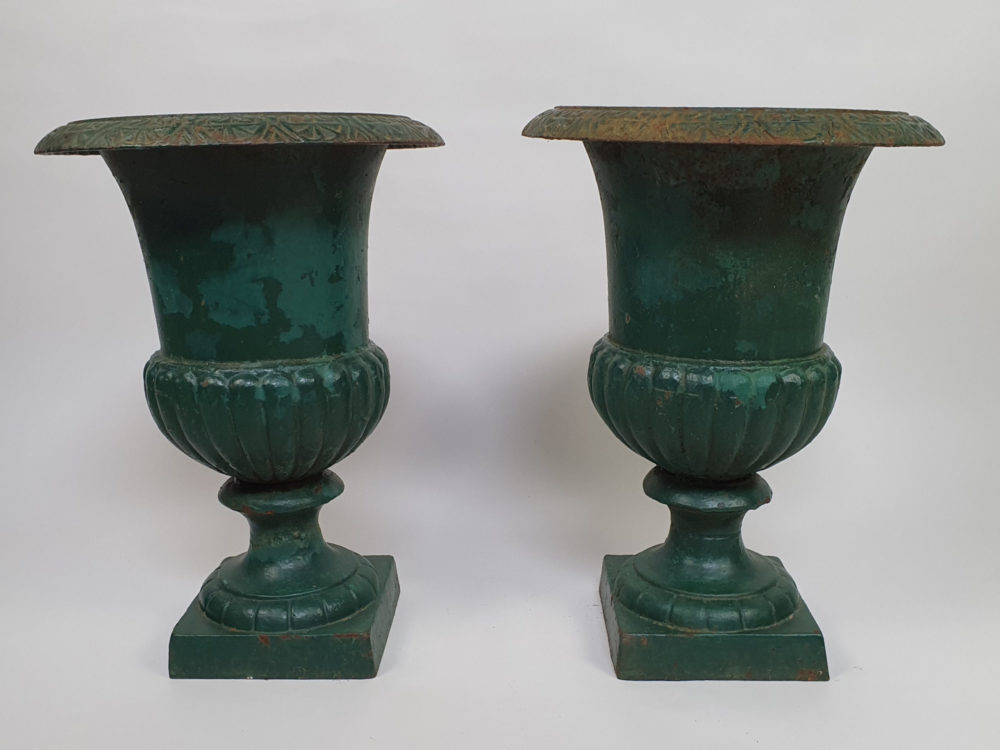 Pair of antique French cast iron Urns with original green paint