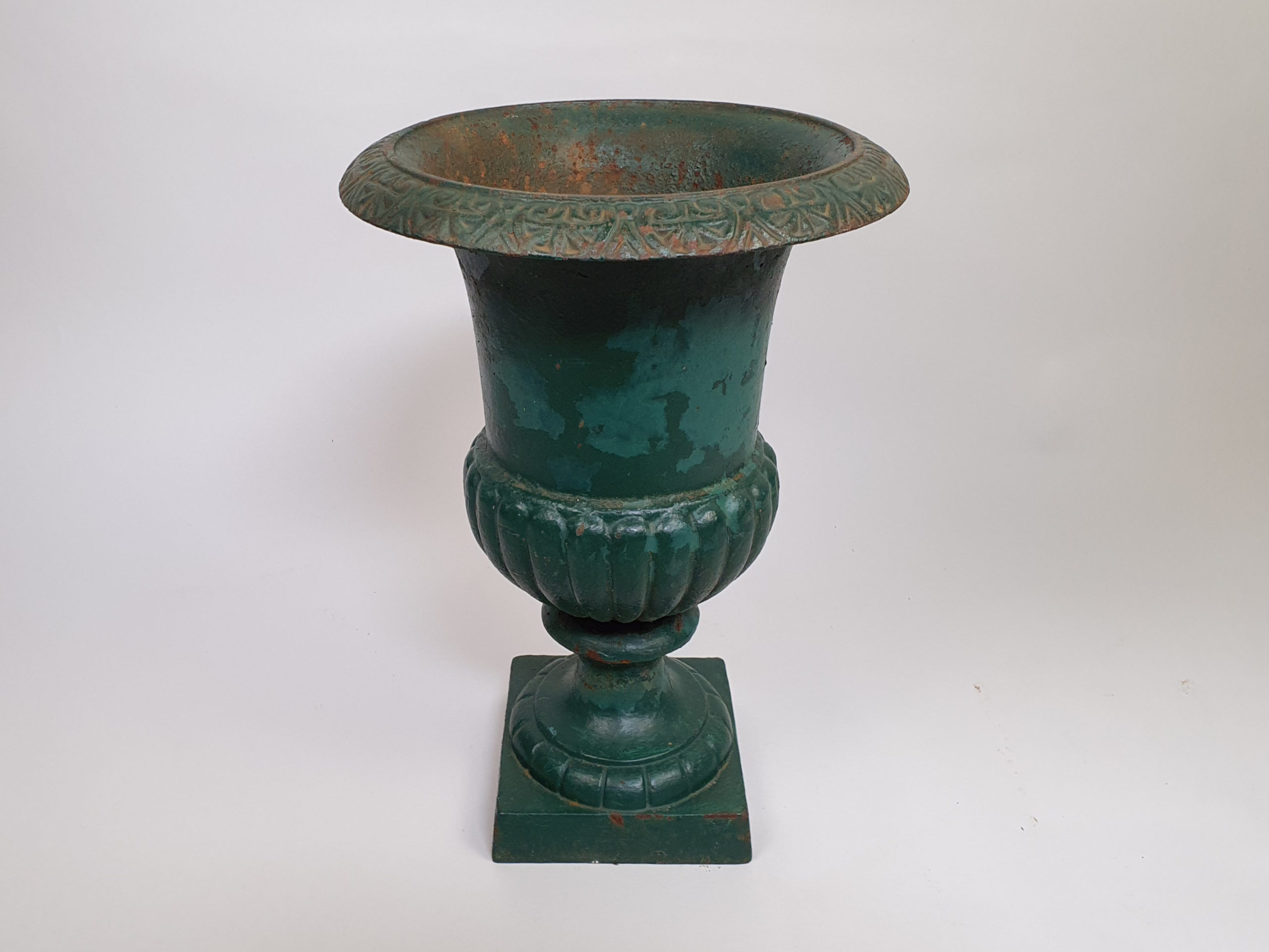 Pair of antique French cast iron Urns with original green paint