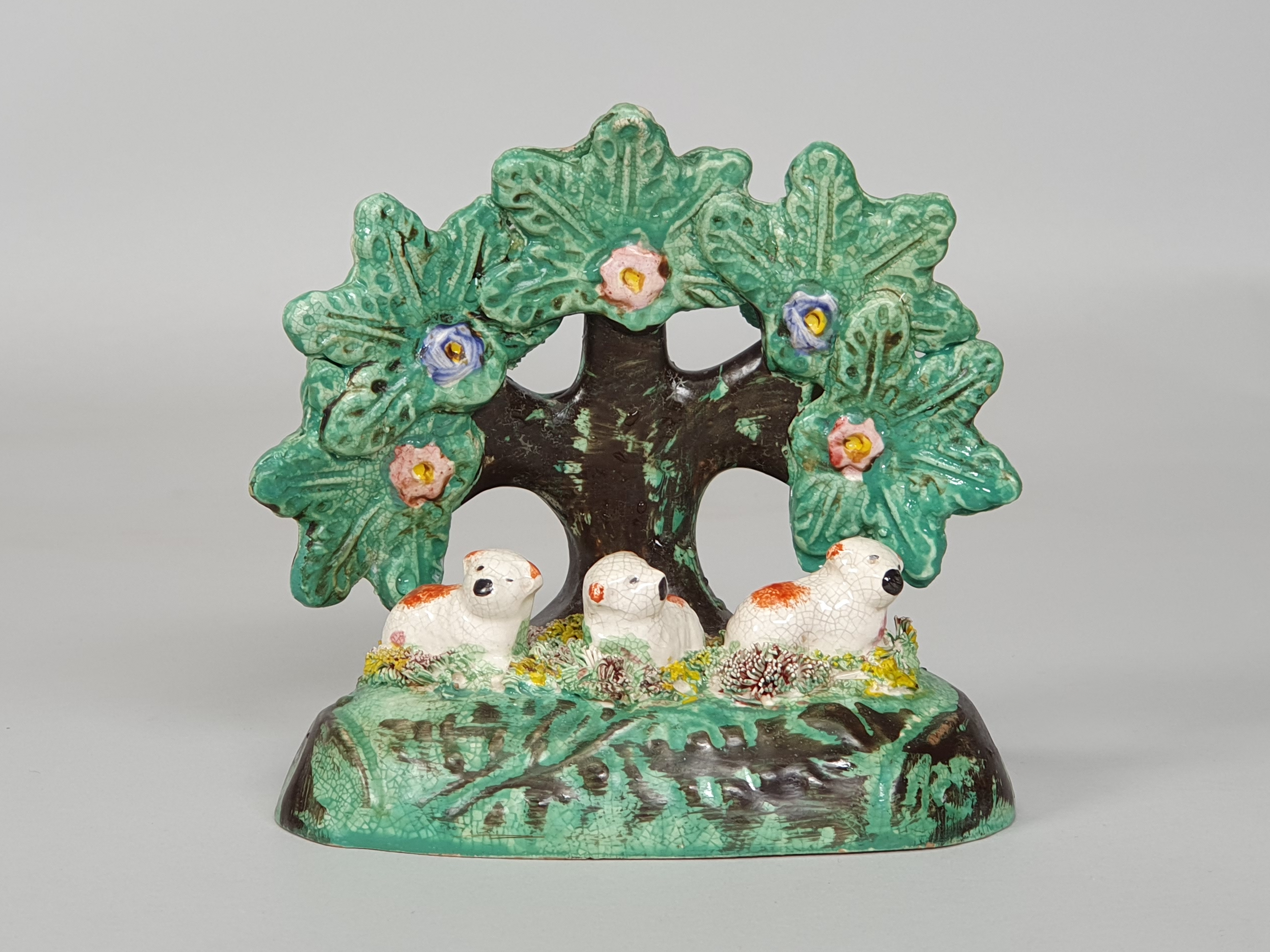 Antique Staffordshire Lambs wide shot