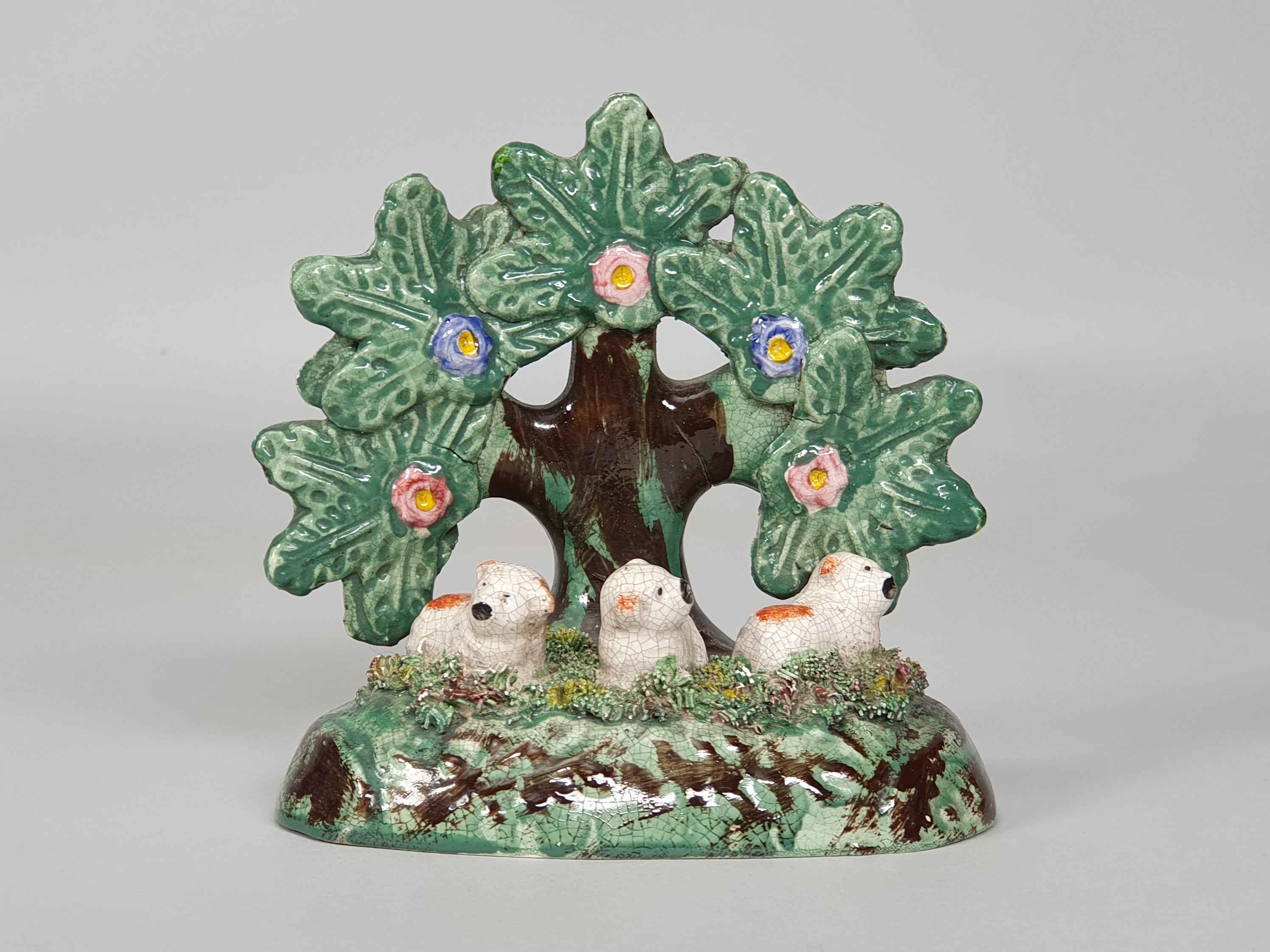 Antique Staffordshire Lambs close up