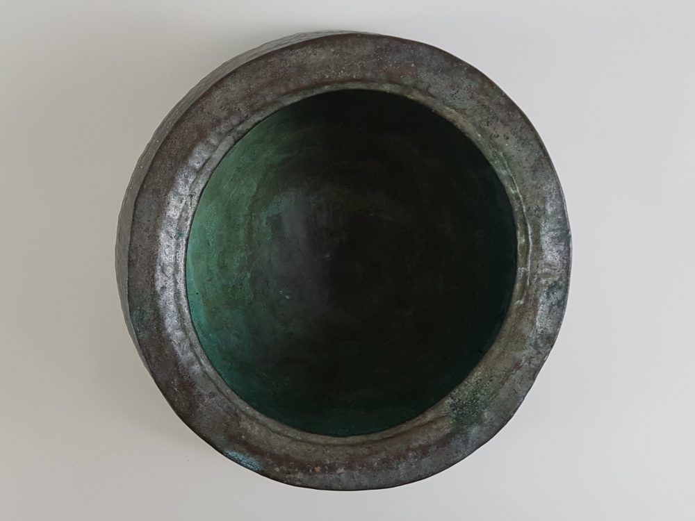 Pair of antique hand beaten copper bowls