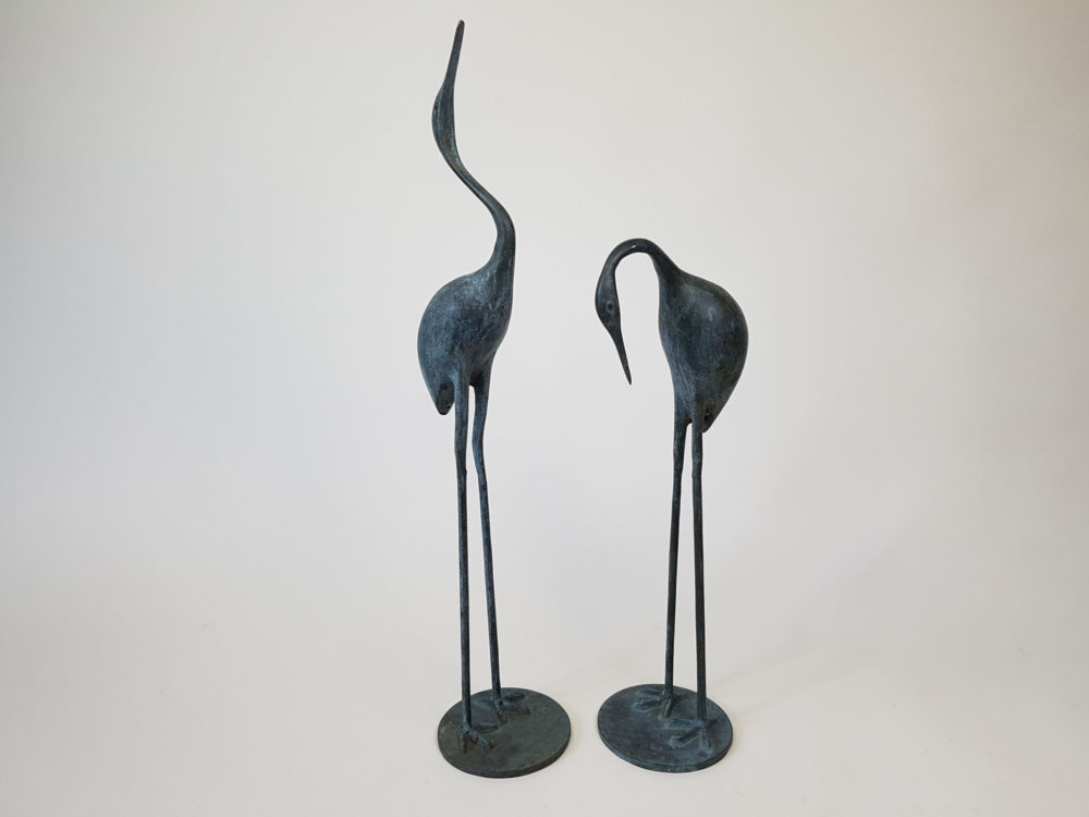 pair of mid century antique bronze stork sculptures