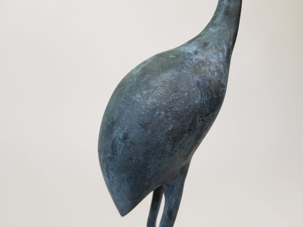 pair of mid century antique bronze stork sculptures