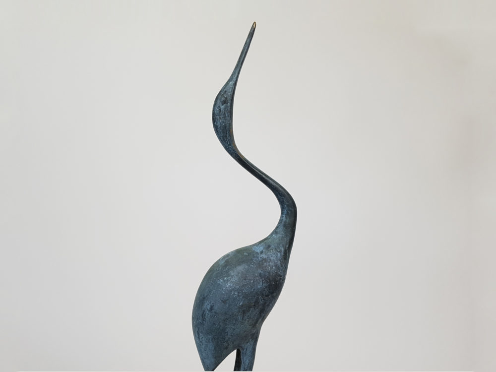 pair of mid century antique bronze stork sculptures