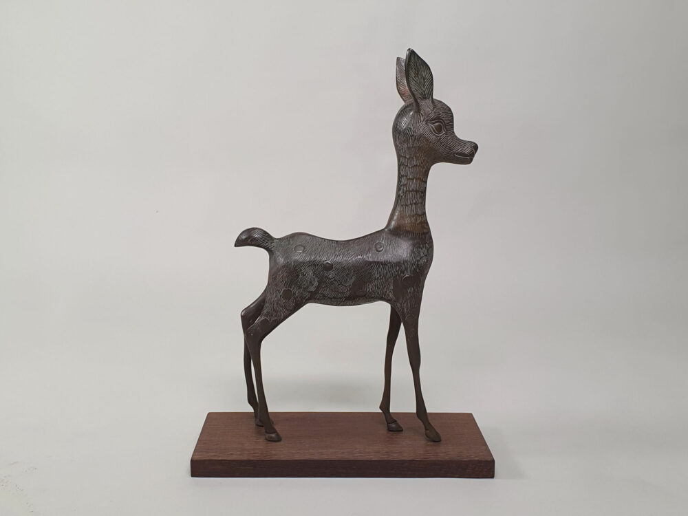 Pair of mid century decorative antique Deer and Fawn Statutes, on wenge plinths