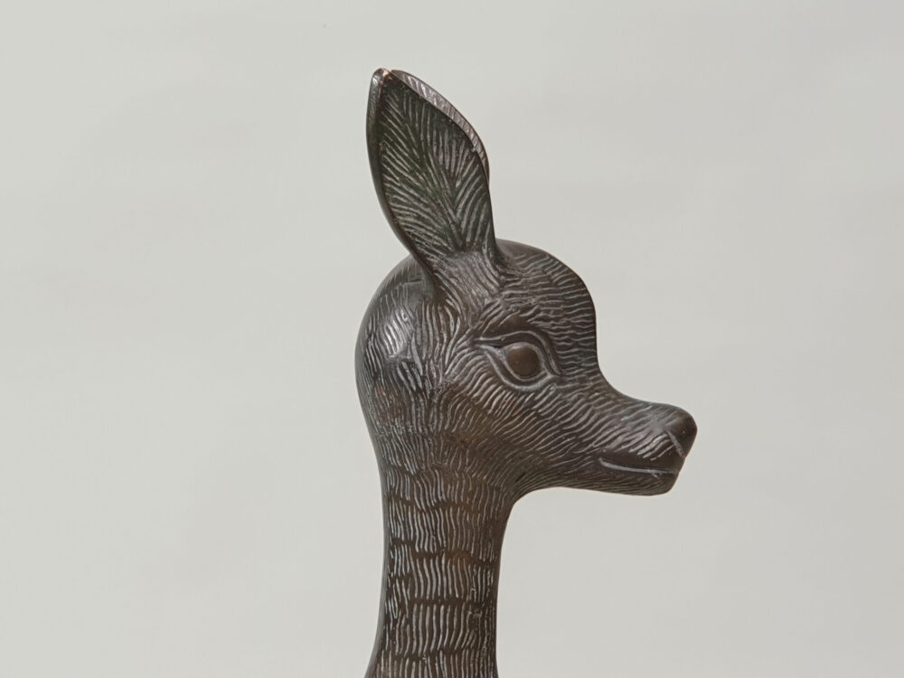 Pair of mid century decorative antique Deer and Fawn Statutes, on wenge plinths