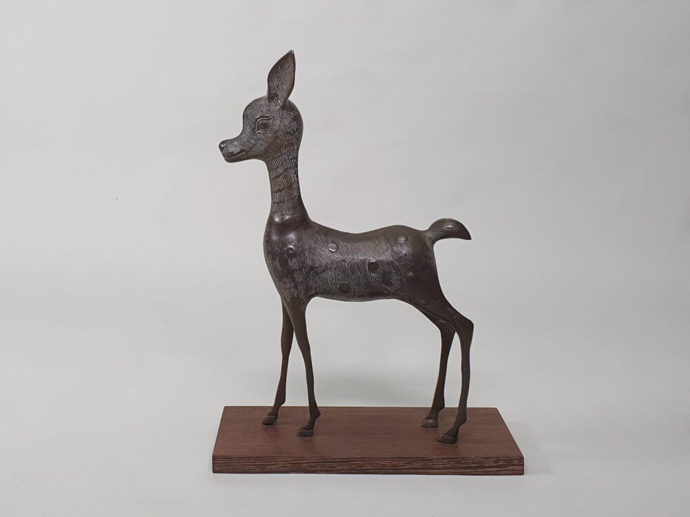 Pair of mid century decorative antique Deer and Fawn Statutes, on wenge plinths