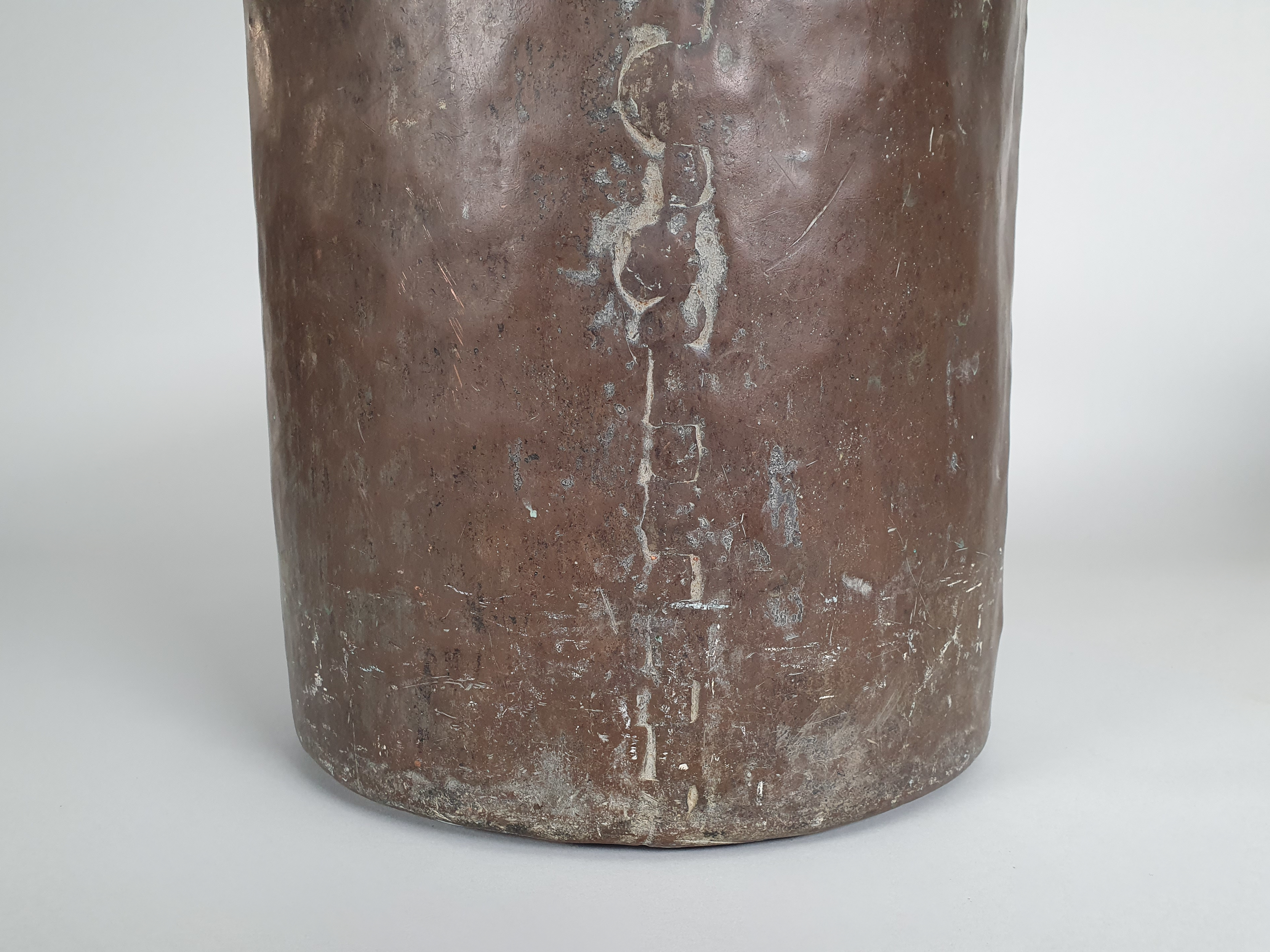 Rustic antique riveted Copper Bucket showing riveted detail