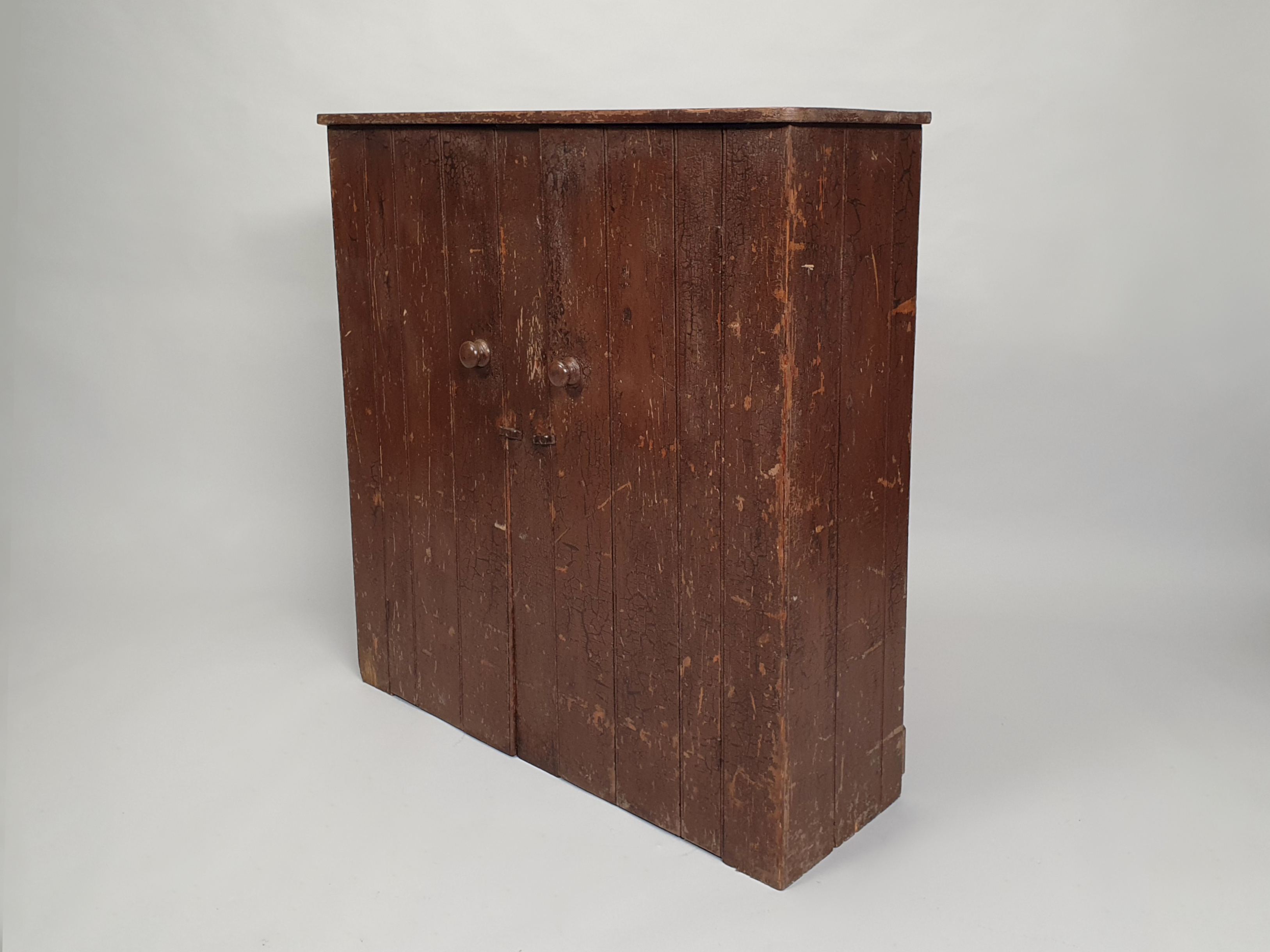antique wall cupboard side view