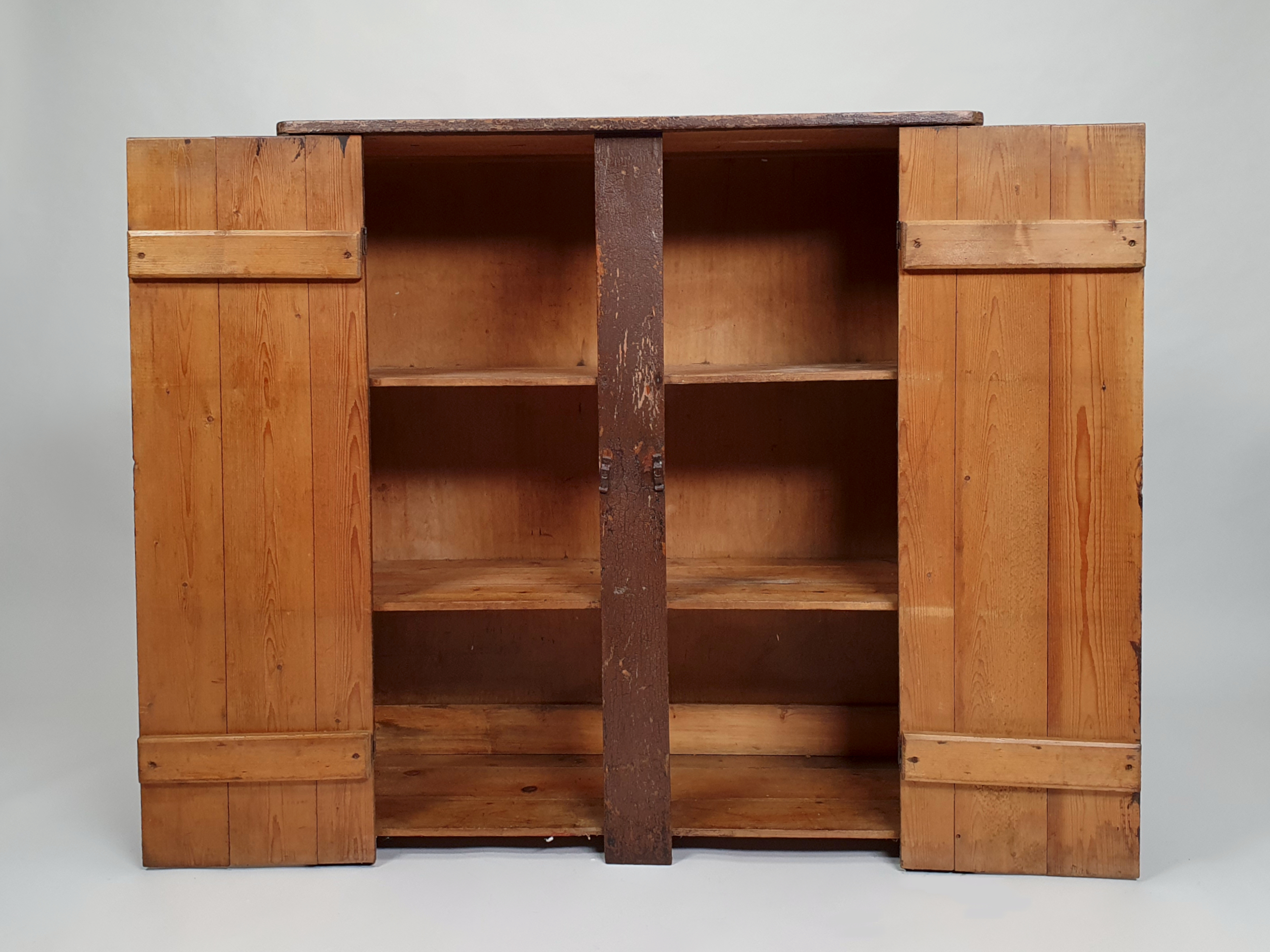 antique wall cupboard inside shelves