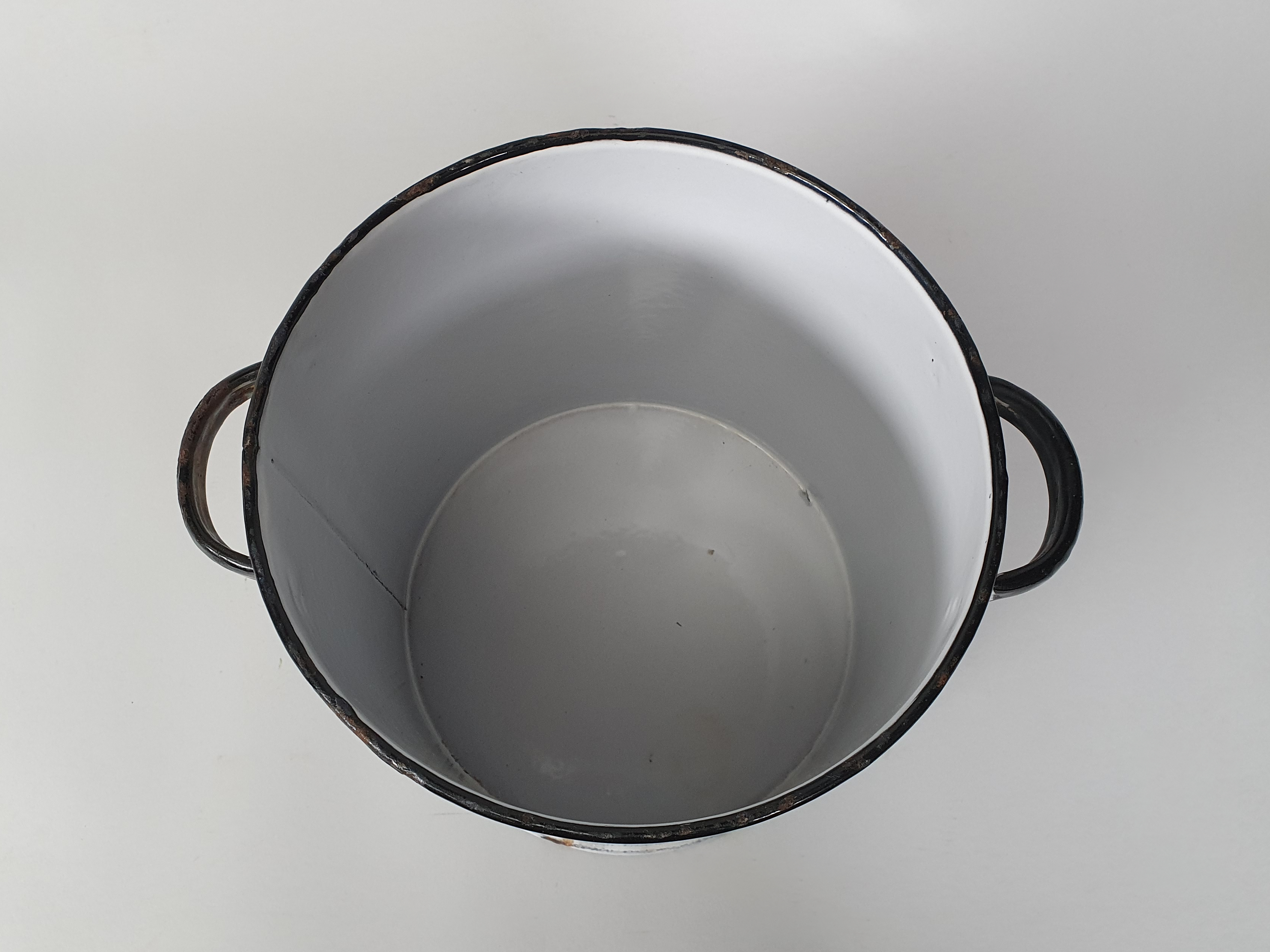 white enamel flour canister inside