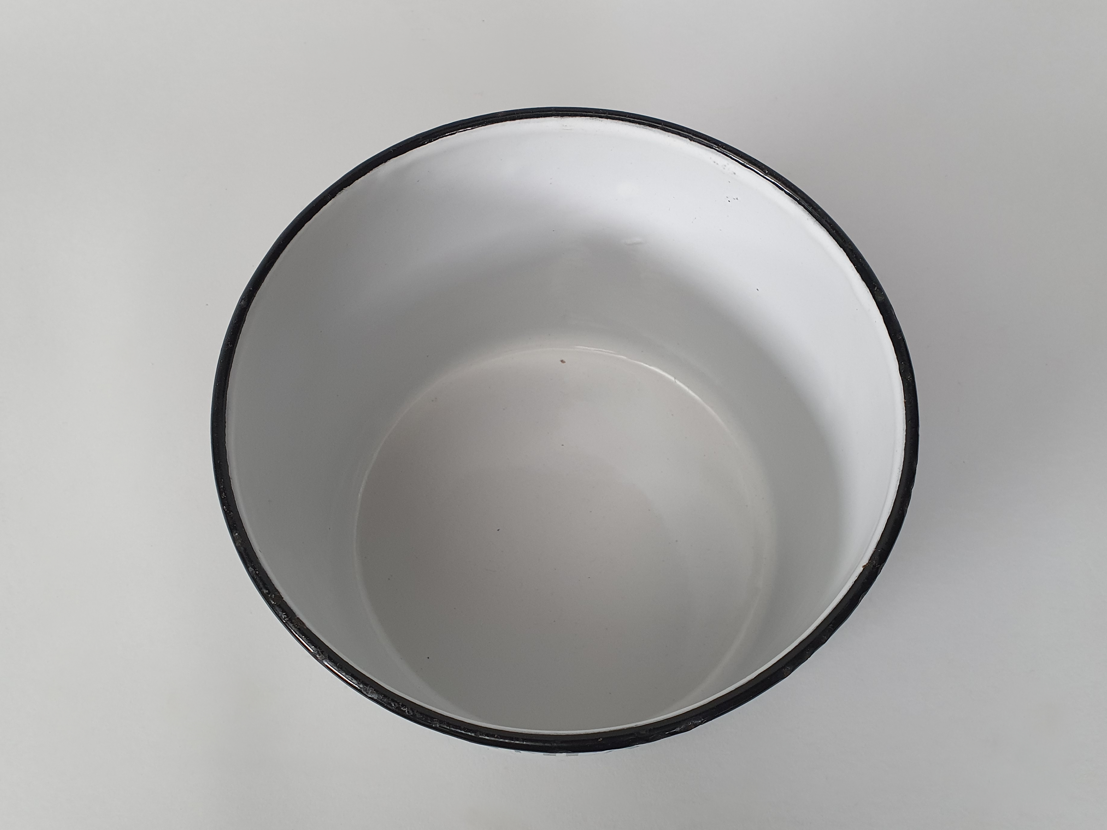 white enamel oatmeal canister inside