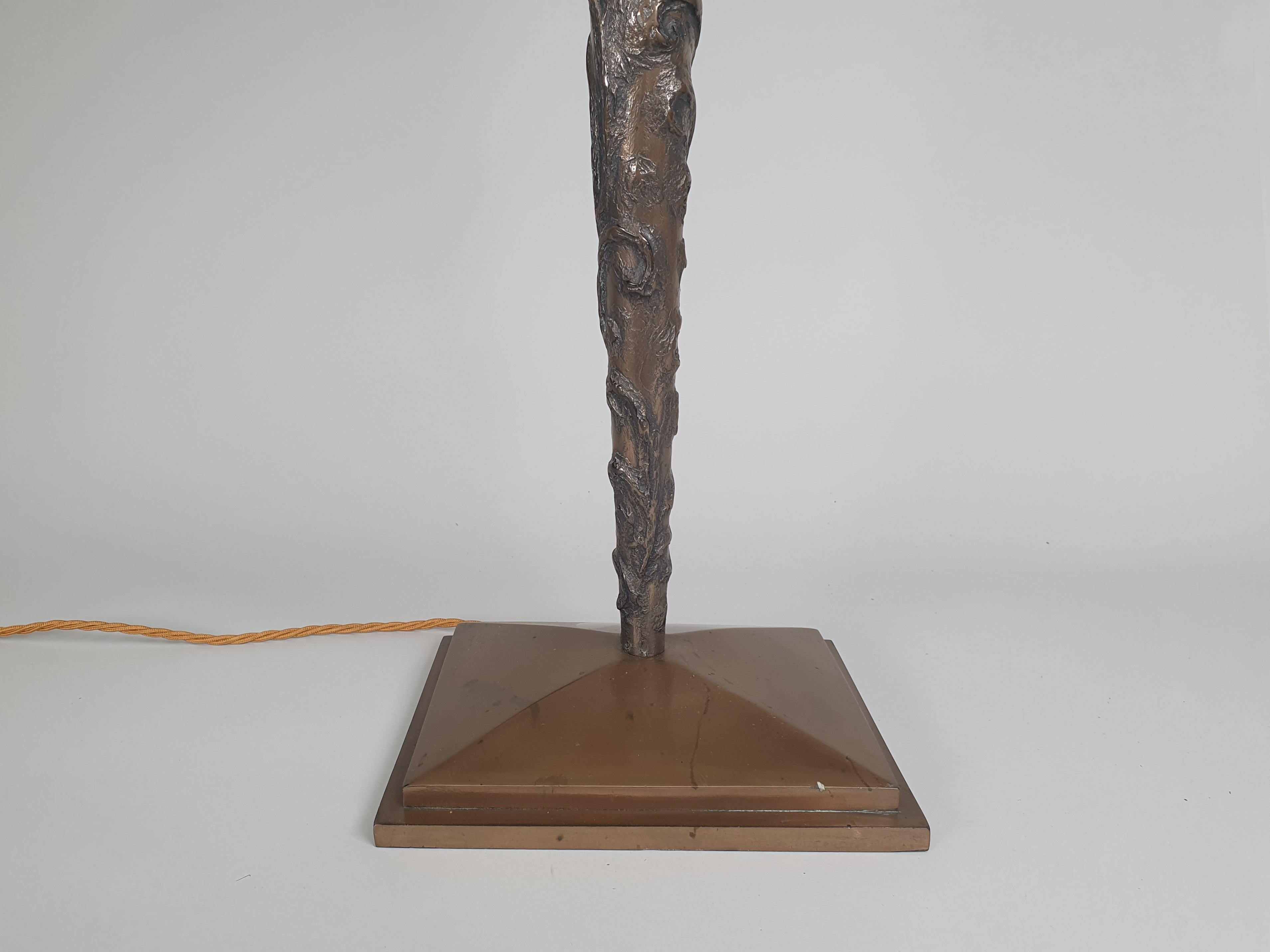 mid century bronze effect table lamp wide shot