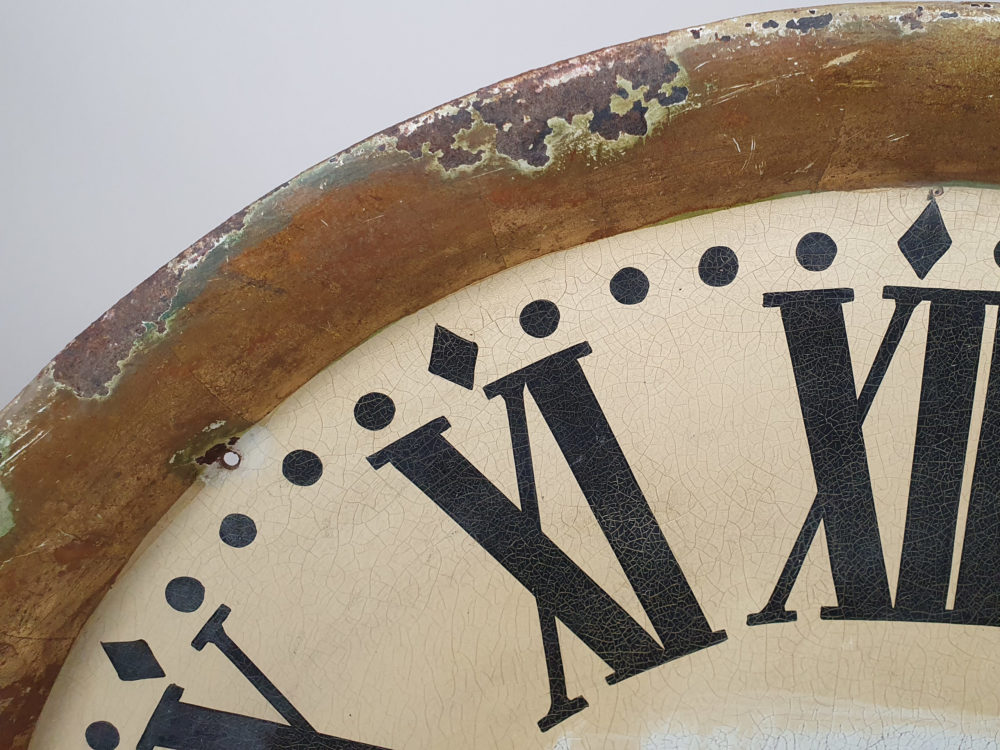 Two sides of a French clock maker's shop Trade Sign